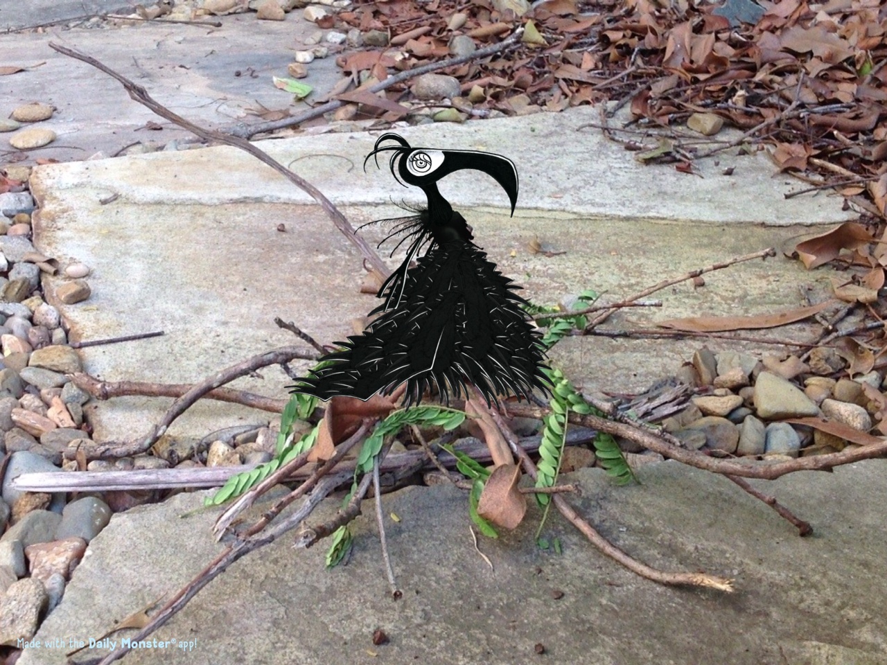 Bird on a nest created using a photograph and matching ink-blot monster created in the Daily Monster app