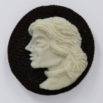 http://beautifuldecay.com/2012/03/01/judith-g-klausners-carved-oreo-cookie-portraits/